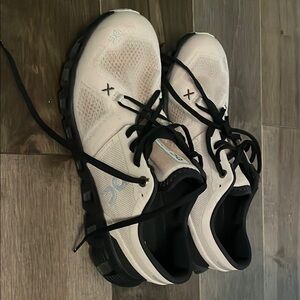 On Running Athletic Shoes in White and Black